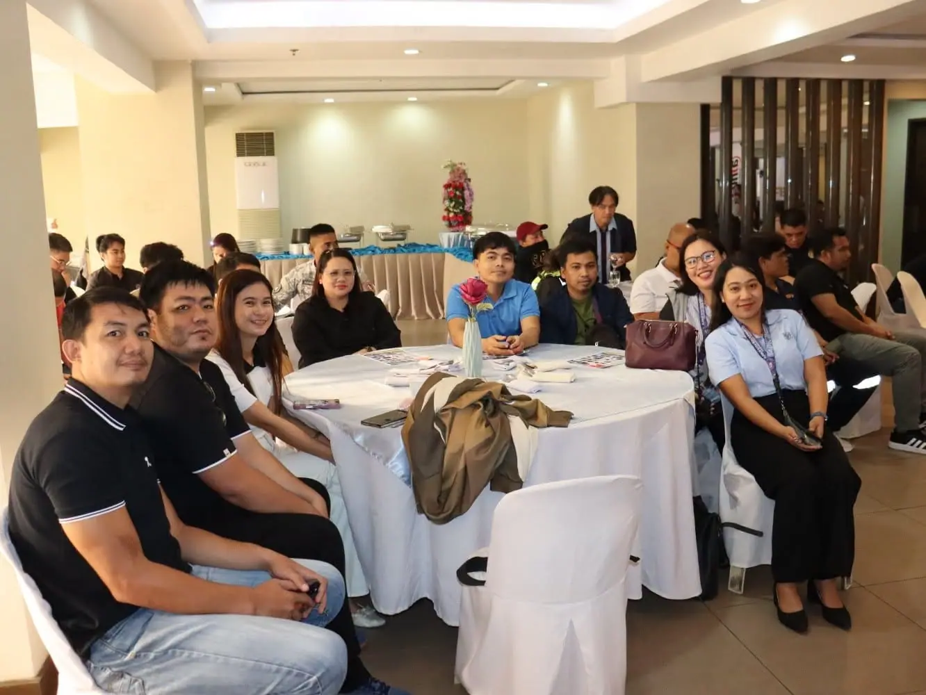 Attendees at round tables during the Dahua Technology event