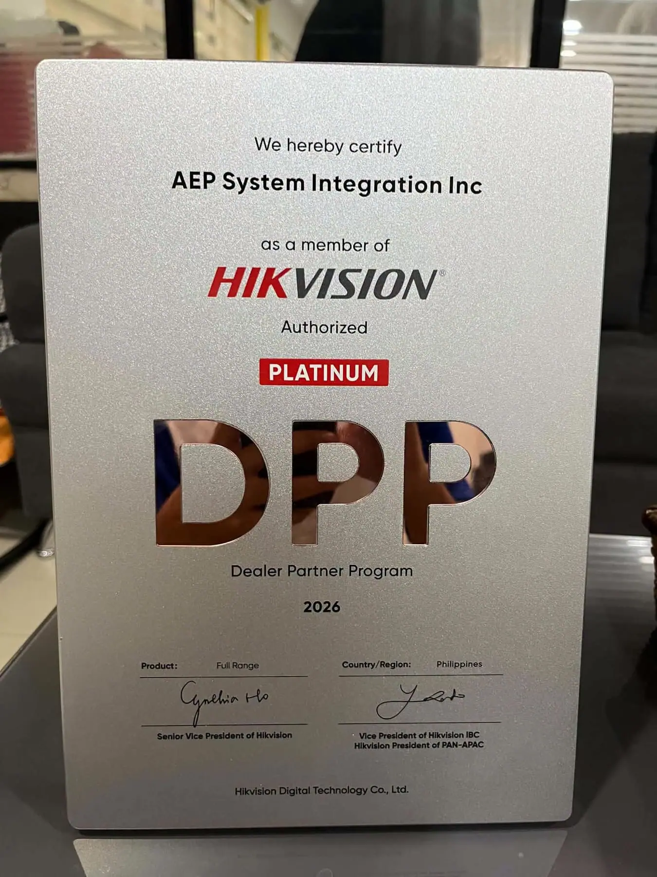 Hikvision plaque recognizing AEP Systems Integration Inc. as an Authorized Platinum partner in the Dealer Partner Program 2026