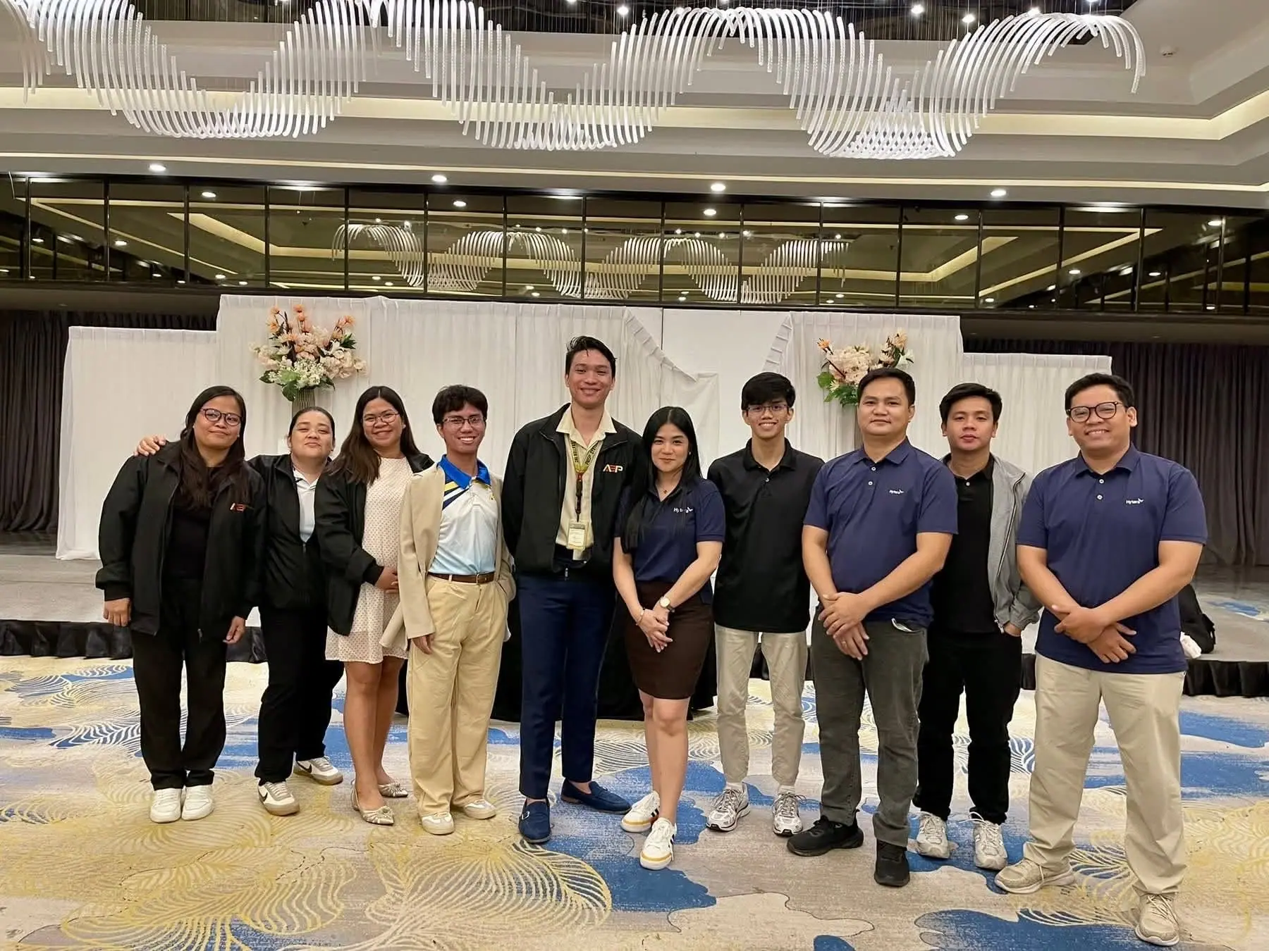 Group photo of AEP staff and guests at the Hytera and Panasonic event