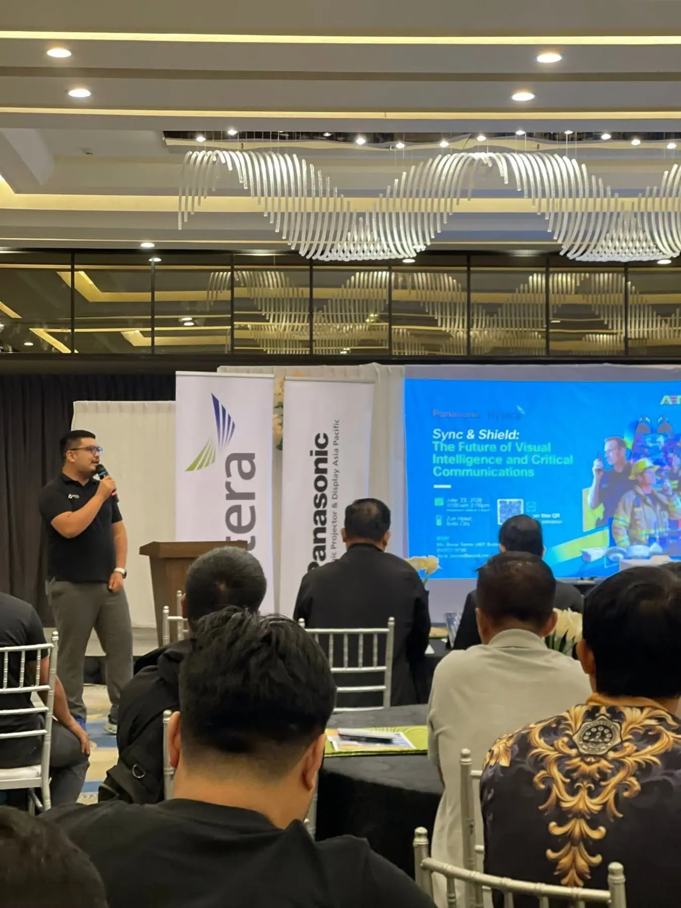Event hall with Hytera and Panasonic banners