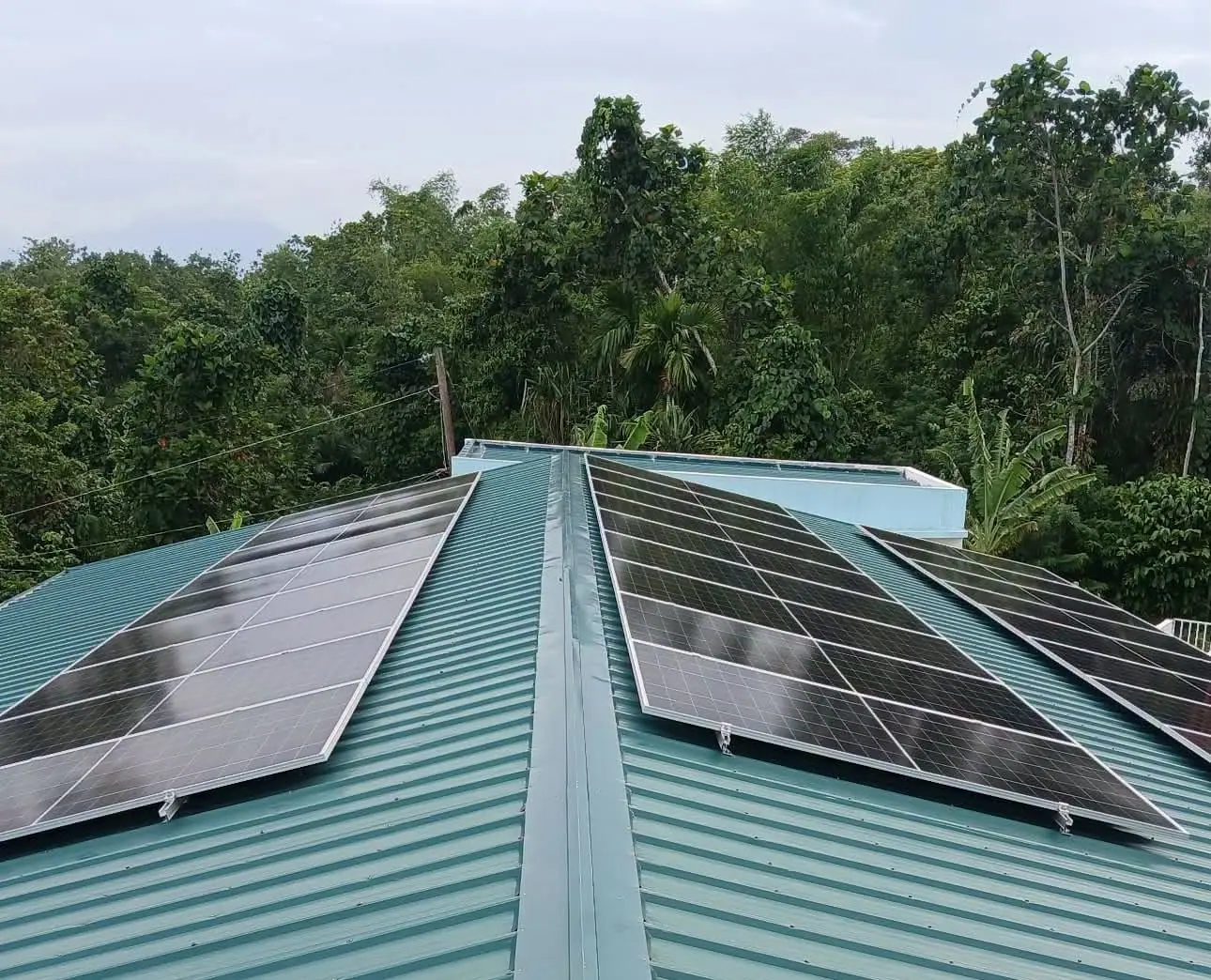 Rooftop solar panel array installed on a metal roof