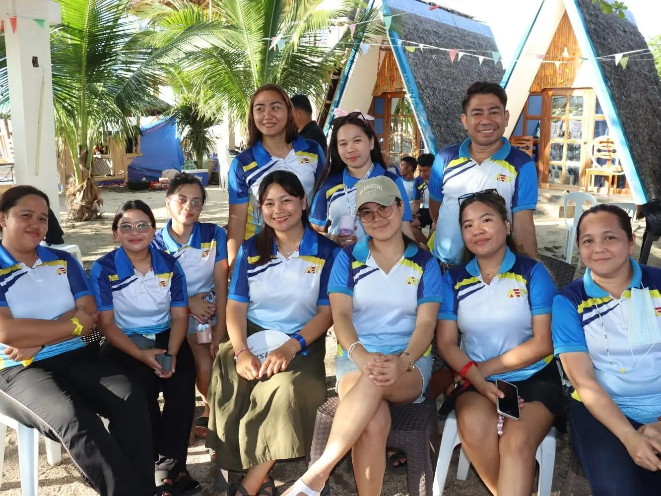 AEP team members in matching shirts at team building